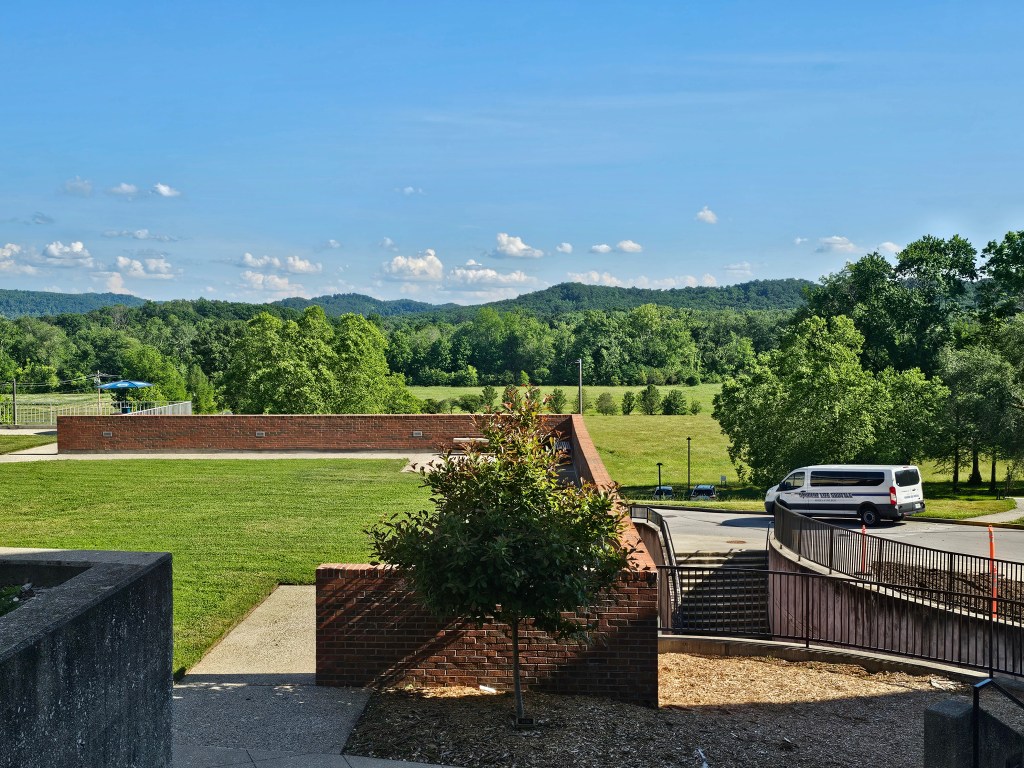 The Appalachian mountains beyond the Alumni patio and the Alumni fields.